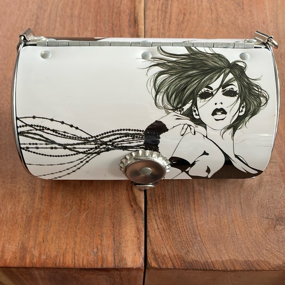 Little Earth cylinder purse